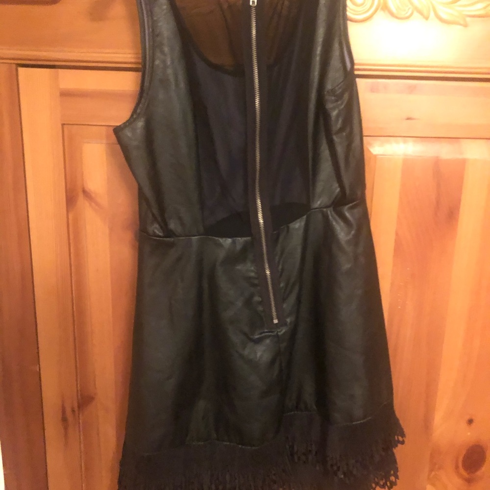 sexy black Pleather dress with a sheer back.